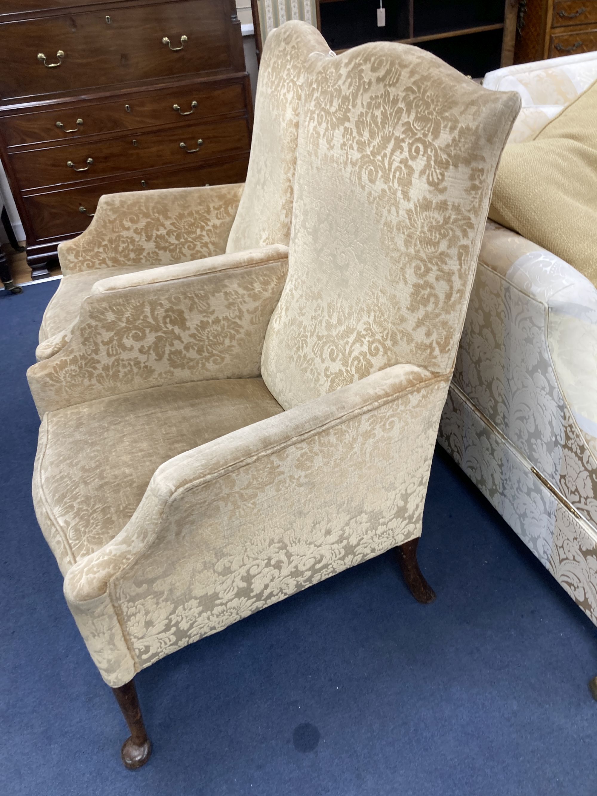 A pair of 1920s upholstered armchairs, width 70cm, depth 70cm, height 102cm